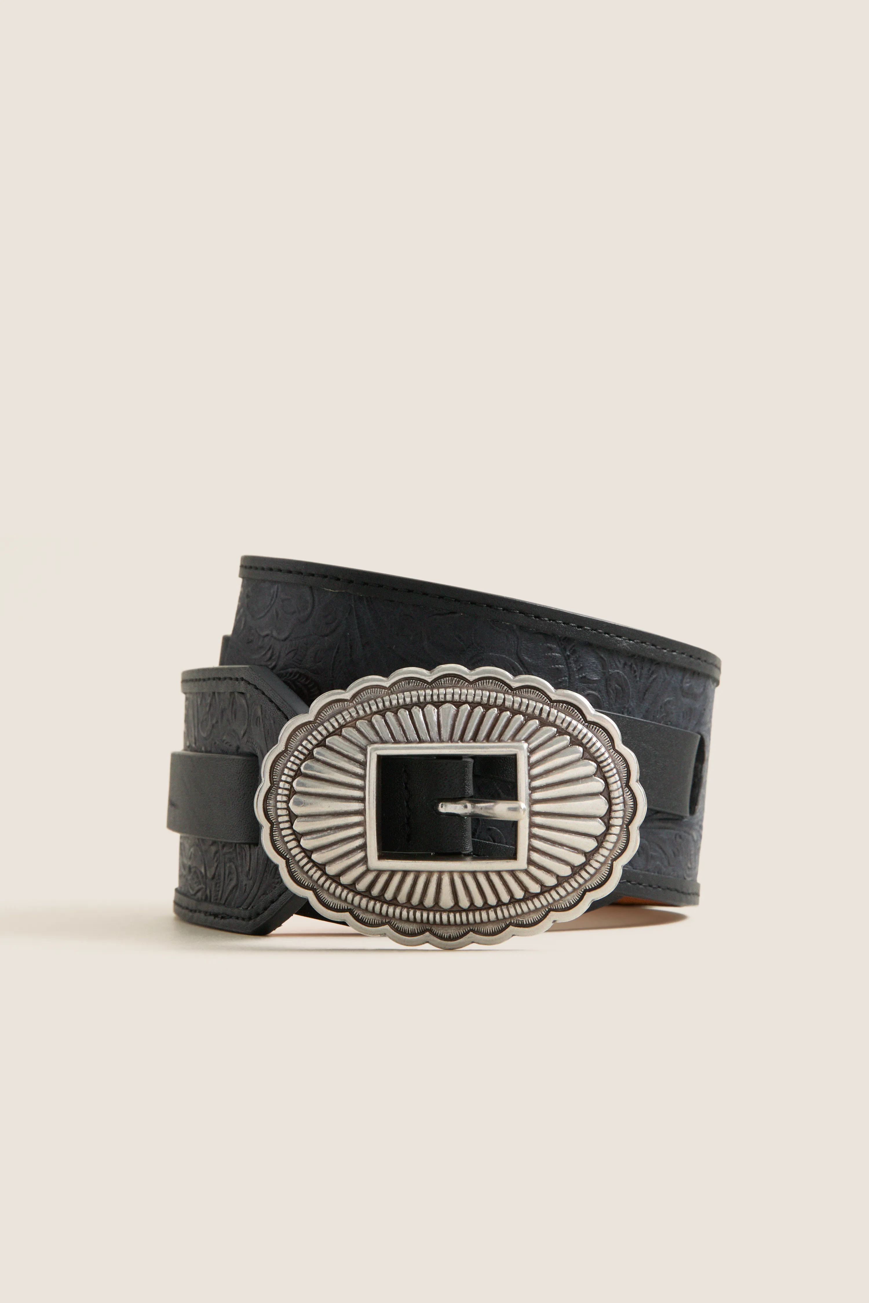 THE GREAT. x Stetson Black and Silver Tooled Waist Belt sold by Tuckernuck