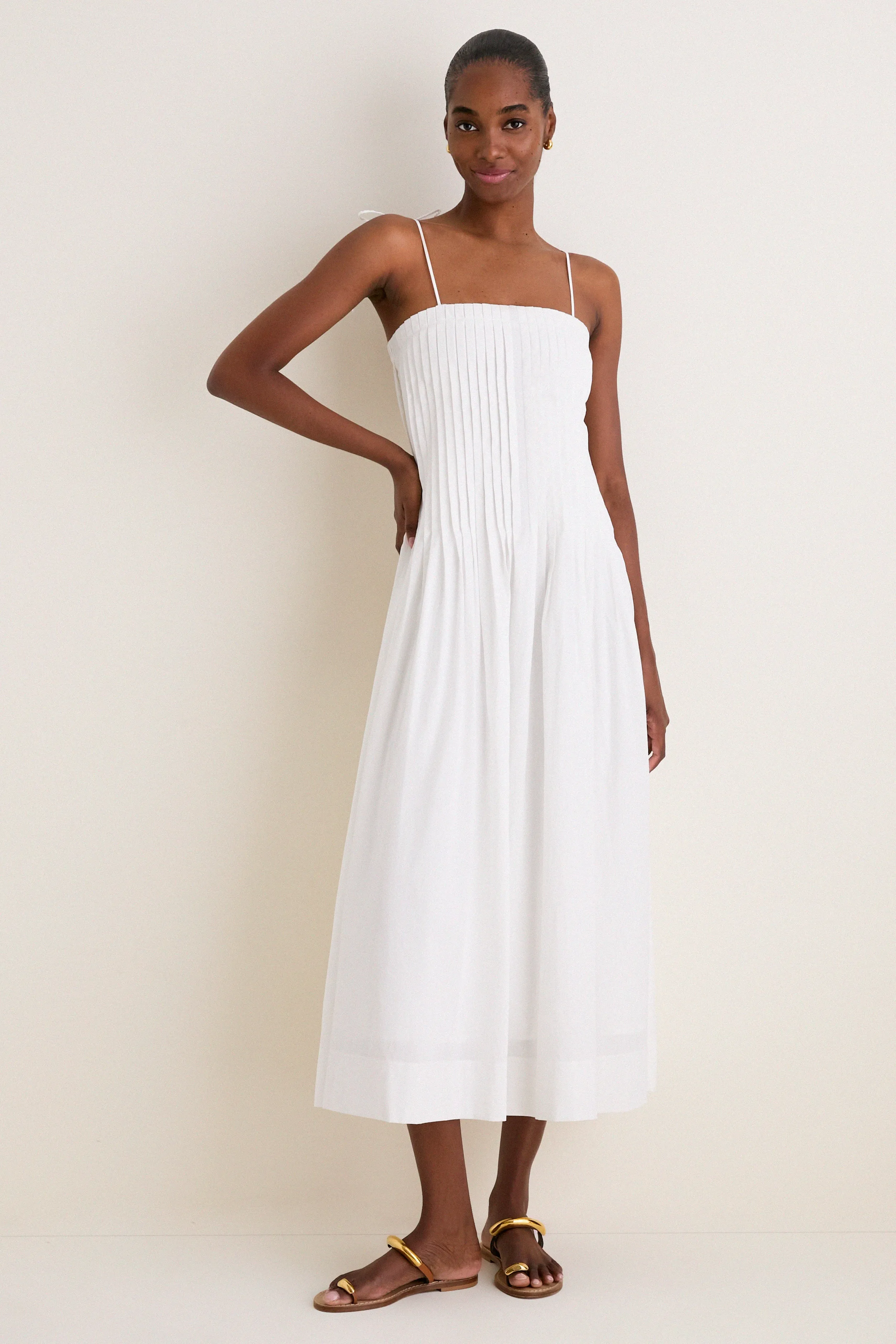 Off White Pleated Front Detail Midi Dress sold by Tuckernuck
