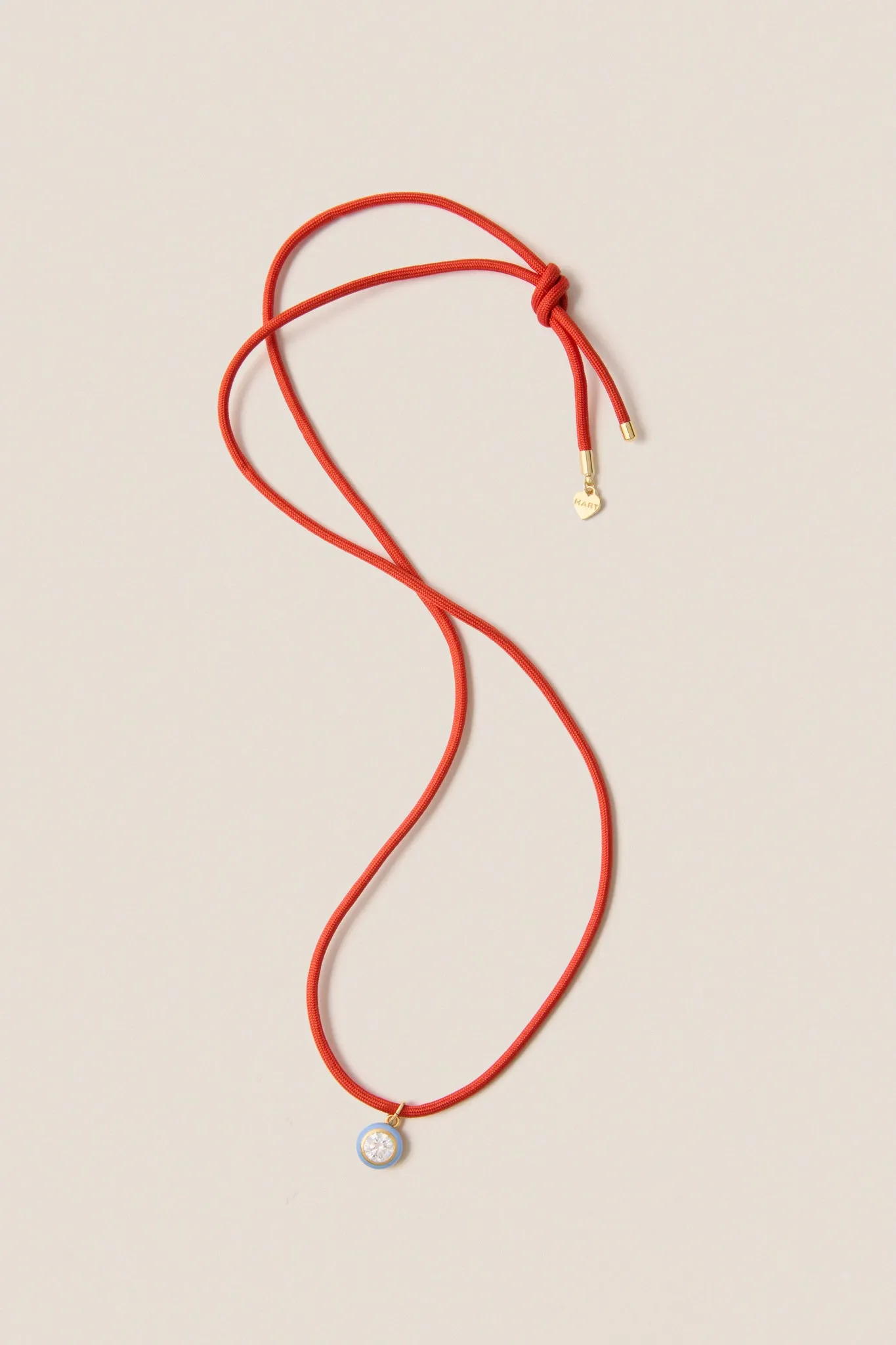 Coral Red Necklace Cord with Blue Bezel Charm sold by Tuckernuck