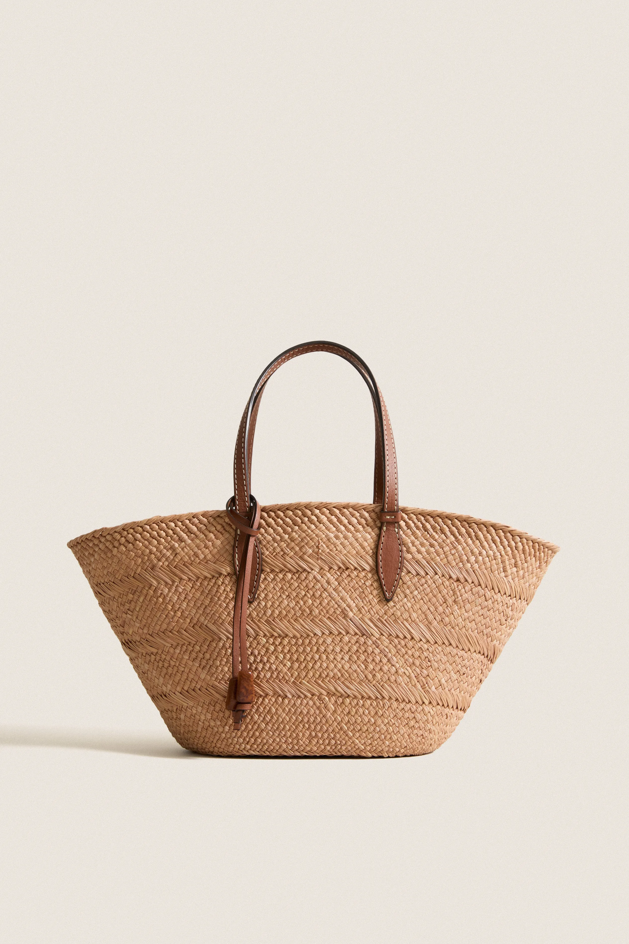 Nuez and Cognac Small Trapeze Basket sold by Tuckernuck