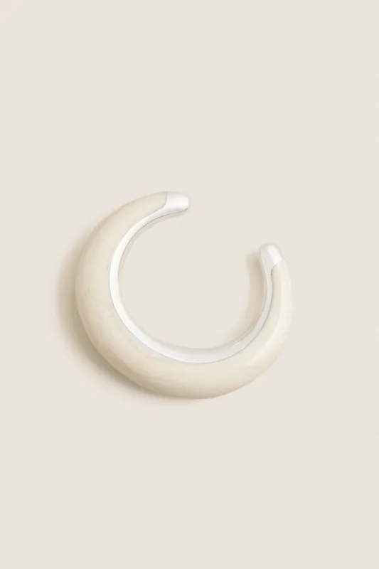 Swirl Chalk Crescent Cuff made by Dinosaur Designs