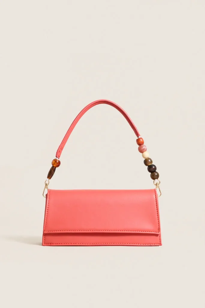 Coral Brooks Crossbody sold by Tuckernuck