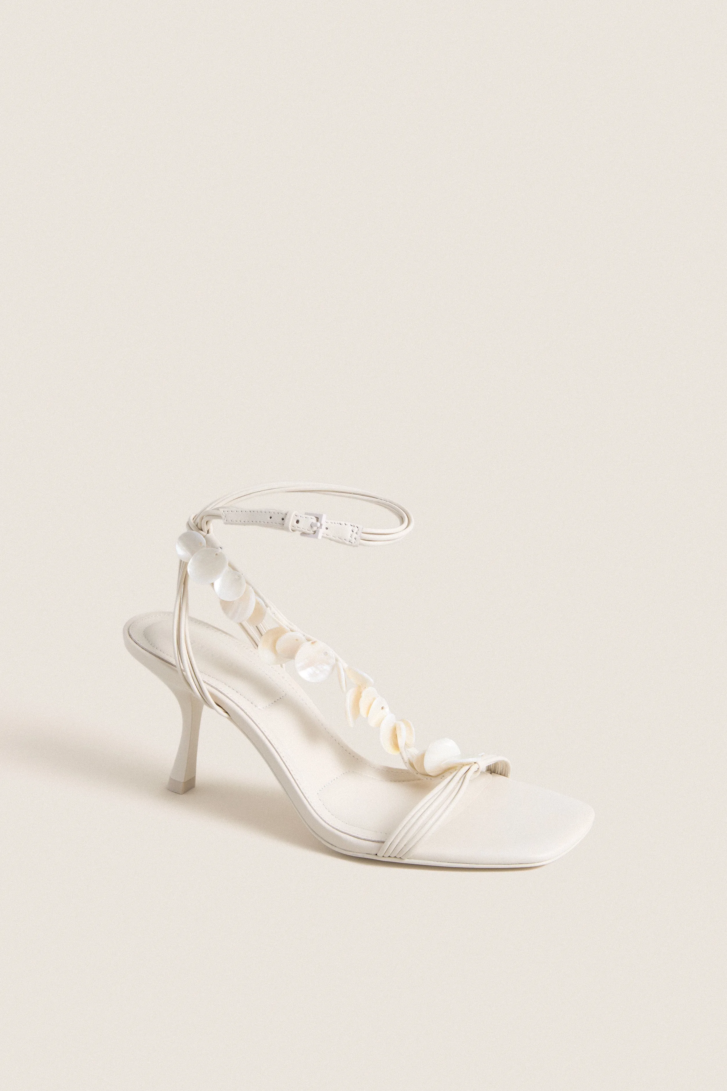 Alabaster Elin Natural Shell Beaded Heels sold by Tuckernuck
