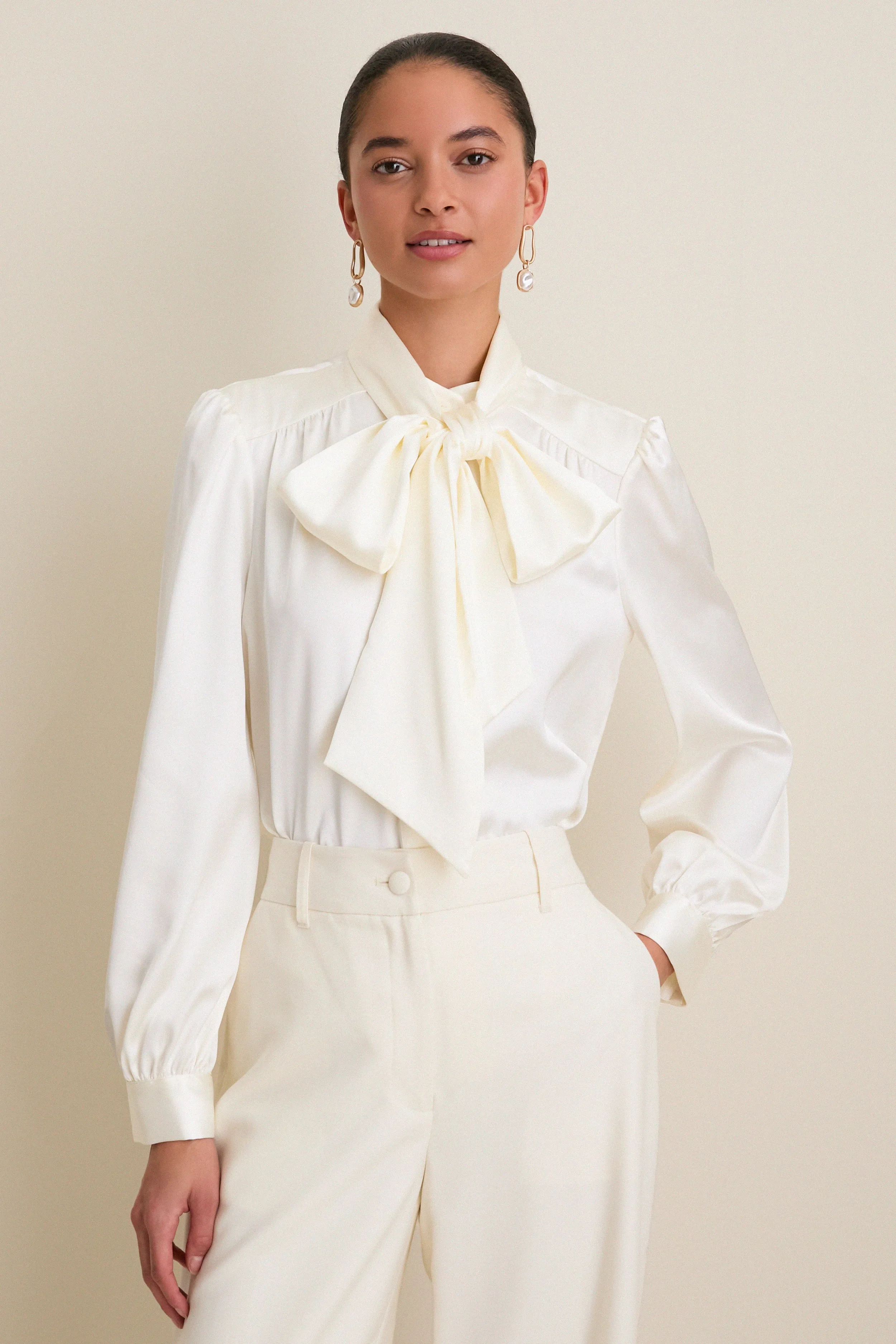 White Satin Brianna Bow Blouse sold by Tuckernuck