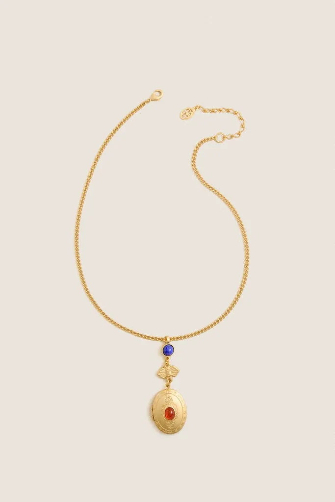 Gold Locket Necklace with Red and Blue Stones sold by Tuckernuck