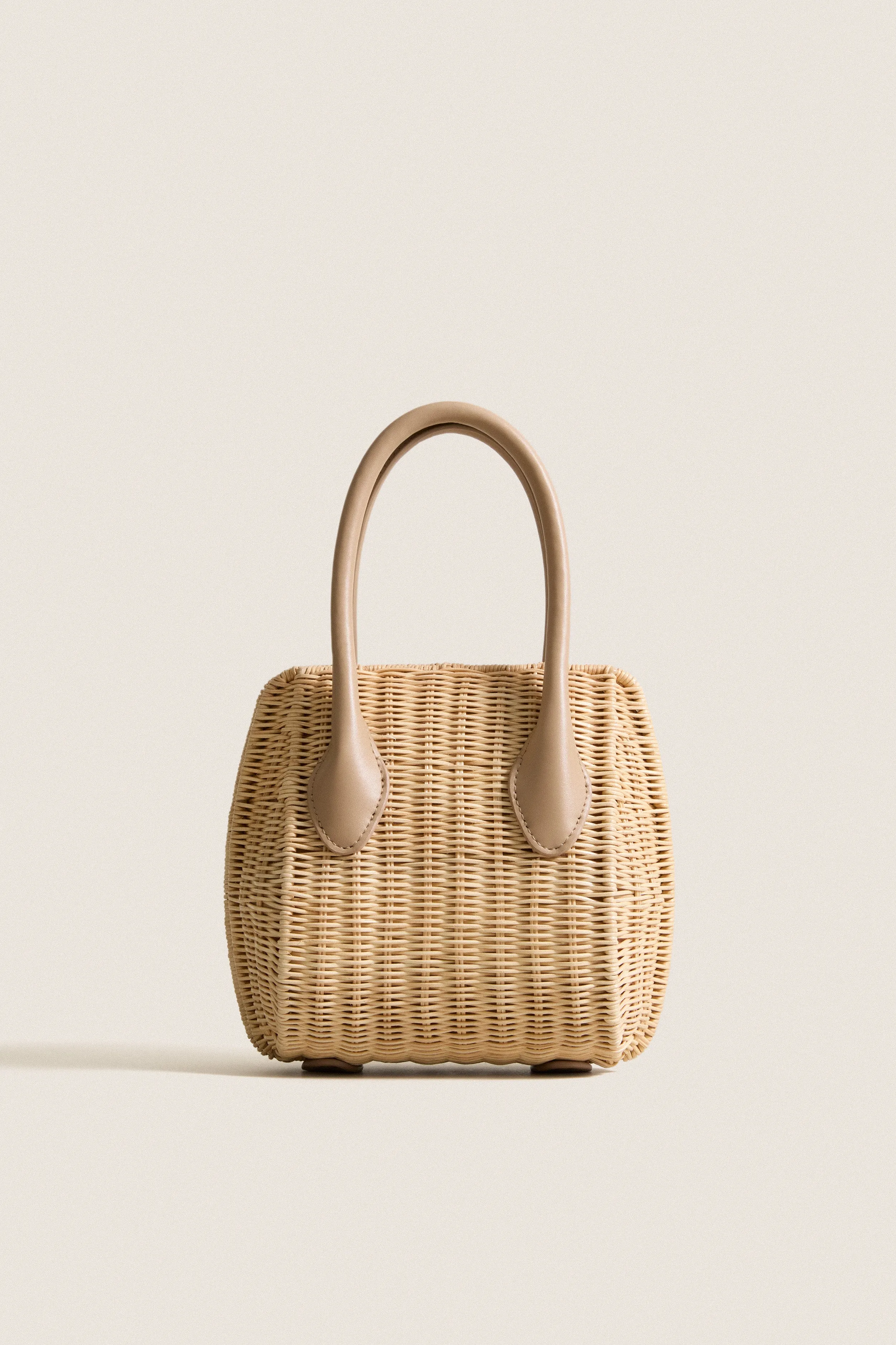 Natural Wicker Wave Top Handle Bag sold by Tuckernuck