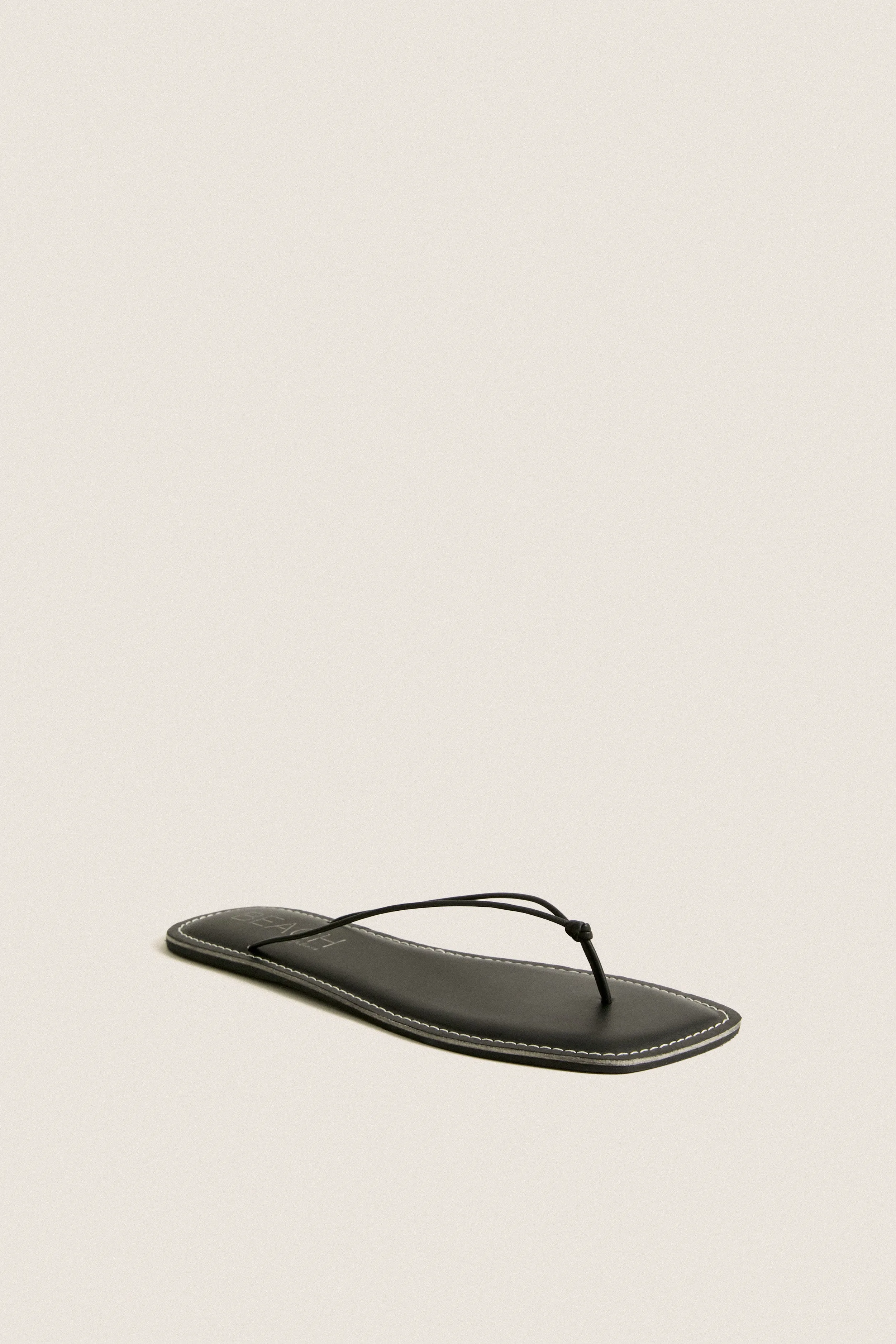 Black Ray Flip Flops sold by Tuckernuck