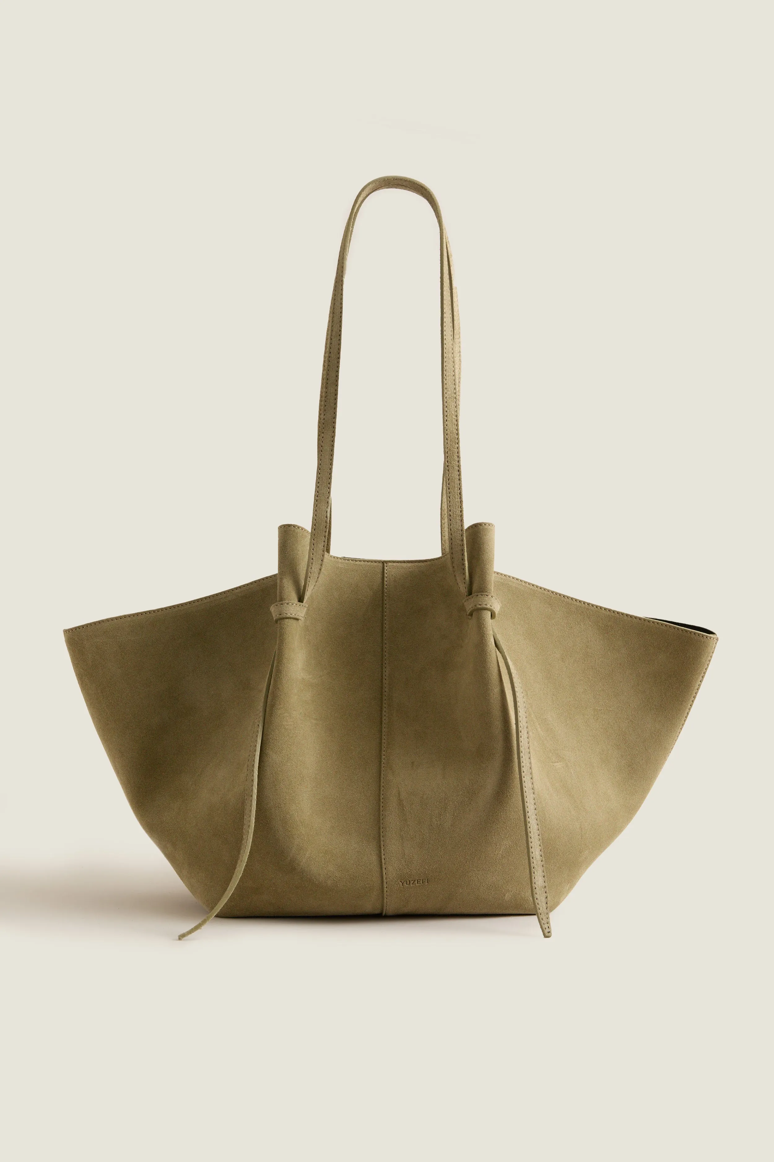Olive Large Suede Mochi Bag sold by Tuckernuck