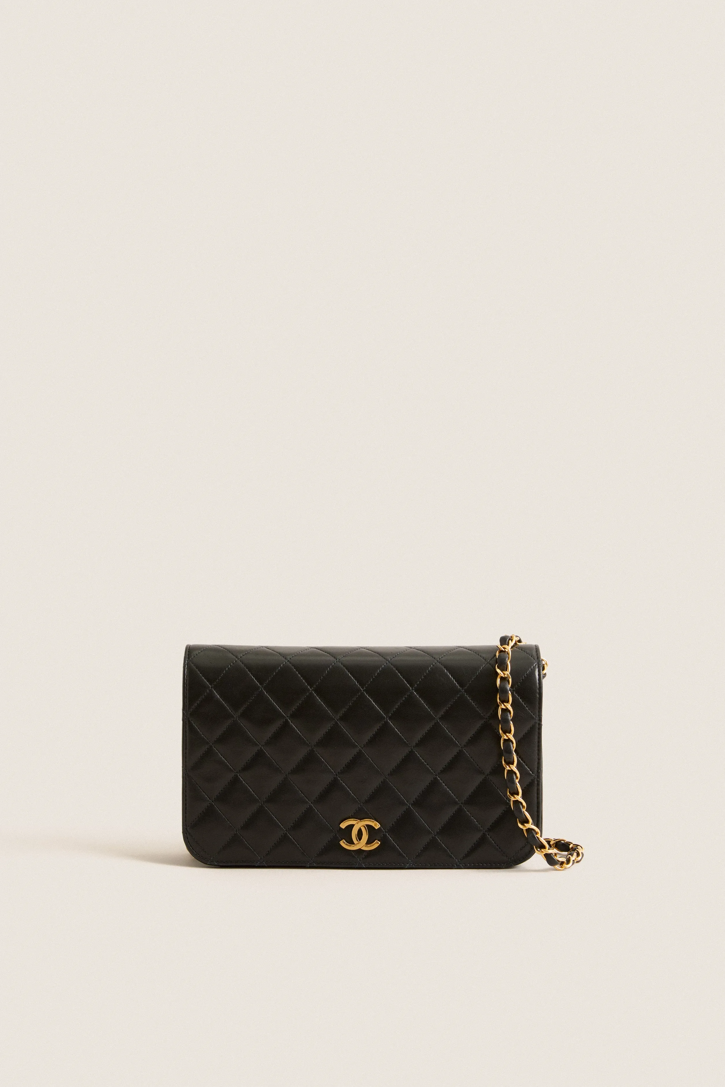 CHANEL Black Matelasse Chain Push Lock Shoulder Bag sold by Tuckernuck