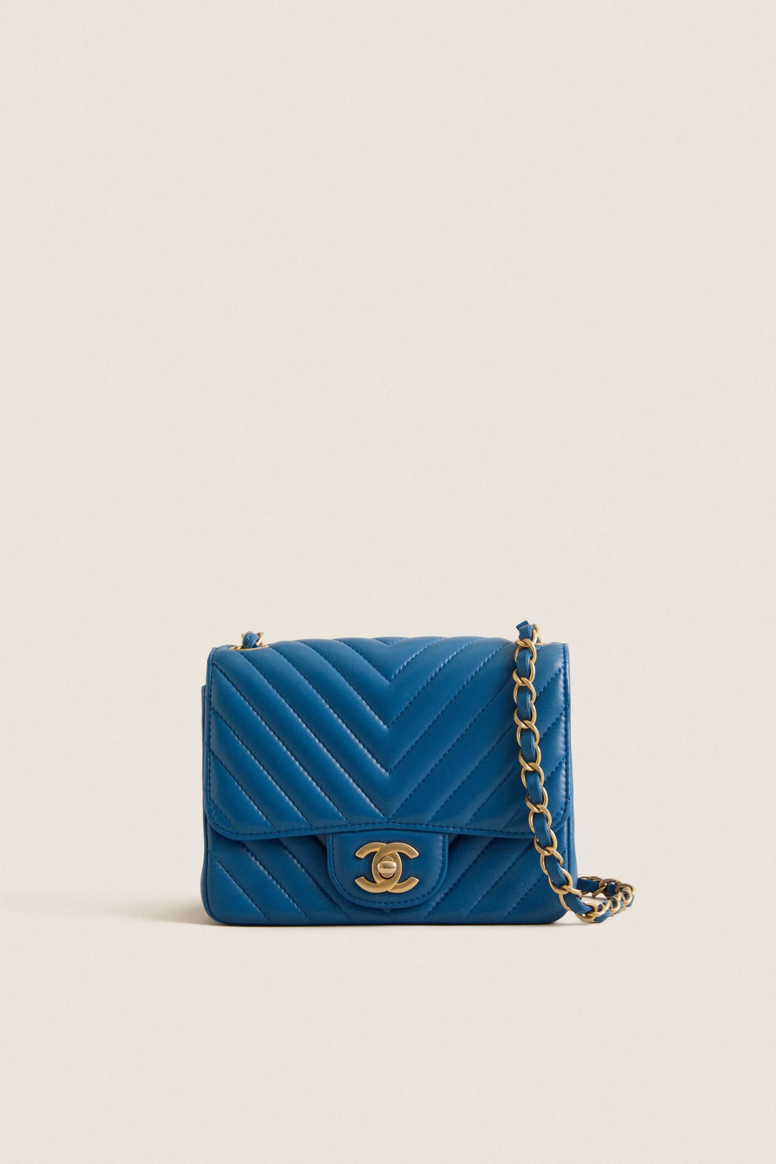 CHANEL V Stitch Blue Chevron Single Flap Chain Bag sold by Tuckernuck