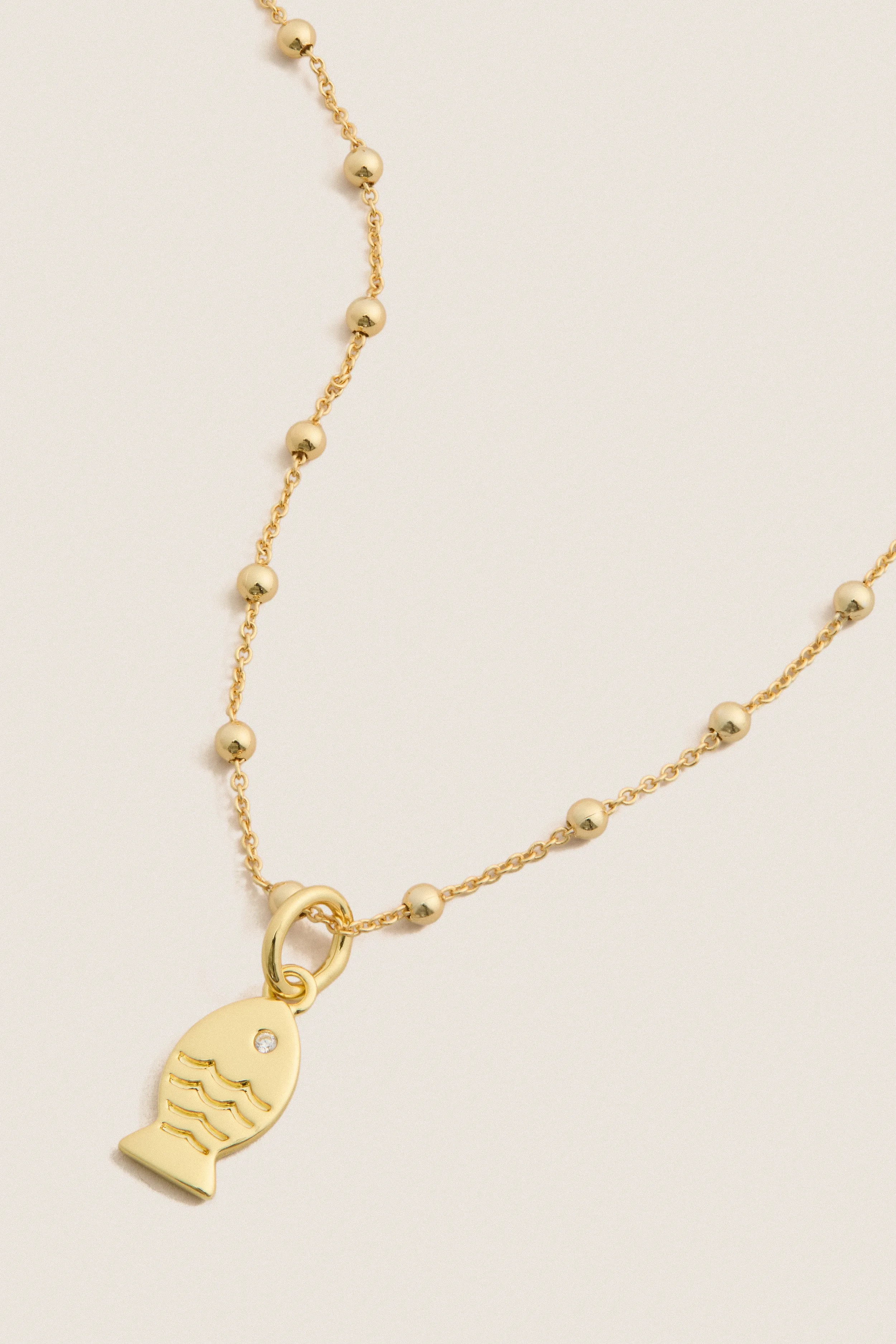 Gold Fish Mini Charm Necklace sold by Tuckernuck product image thumbnail 4