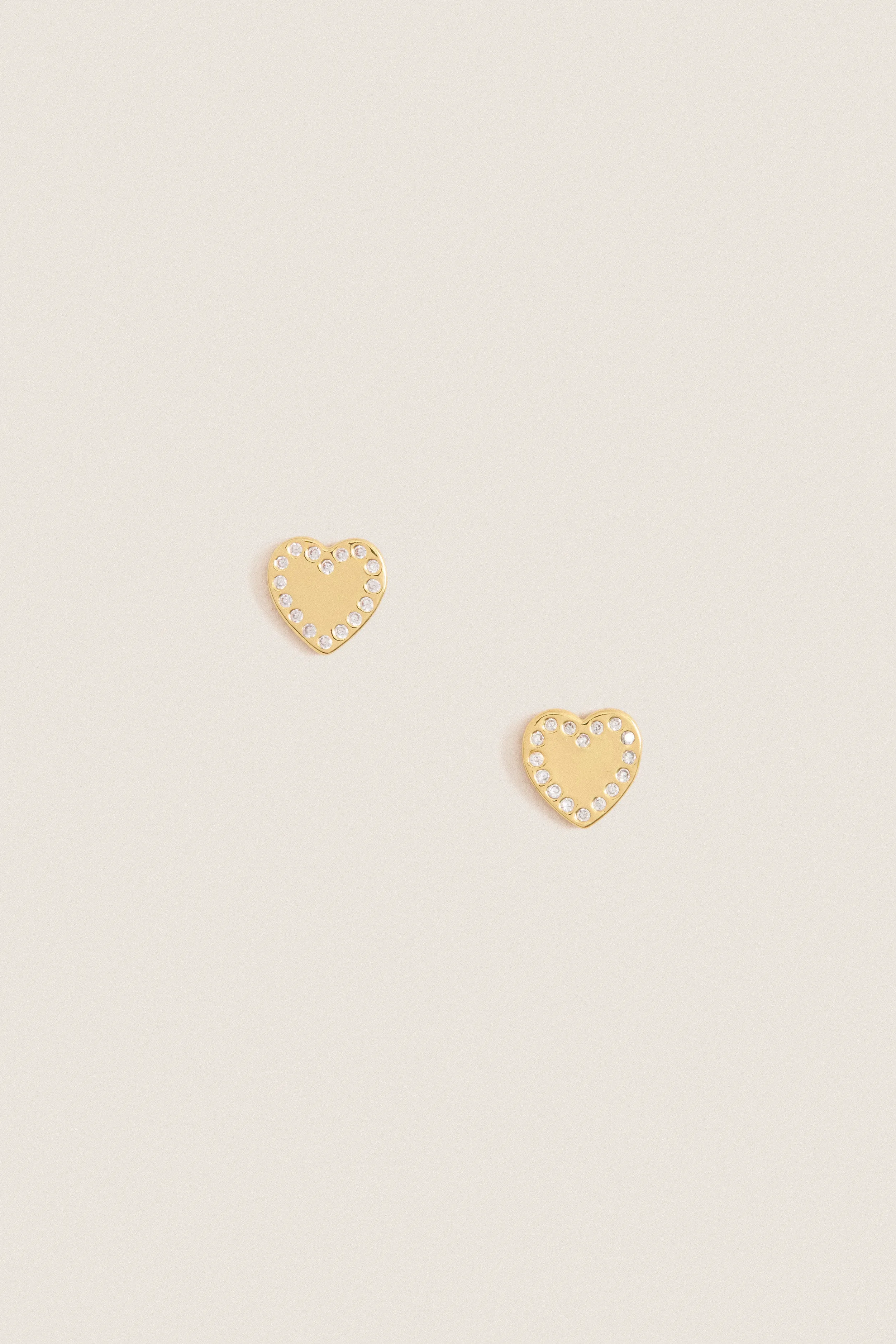Gold Heart Cora Stud Earrings sold by Tuckernuck