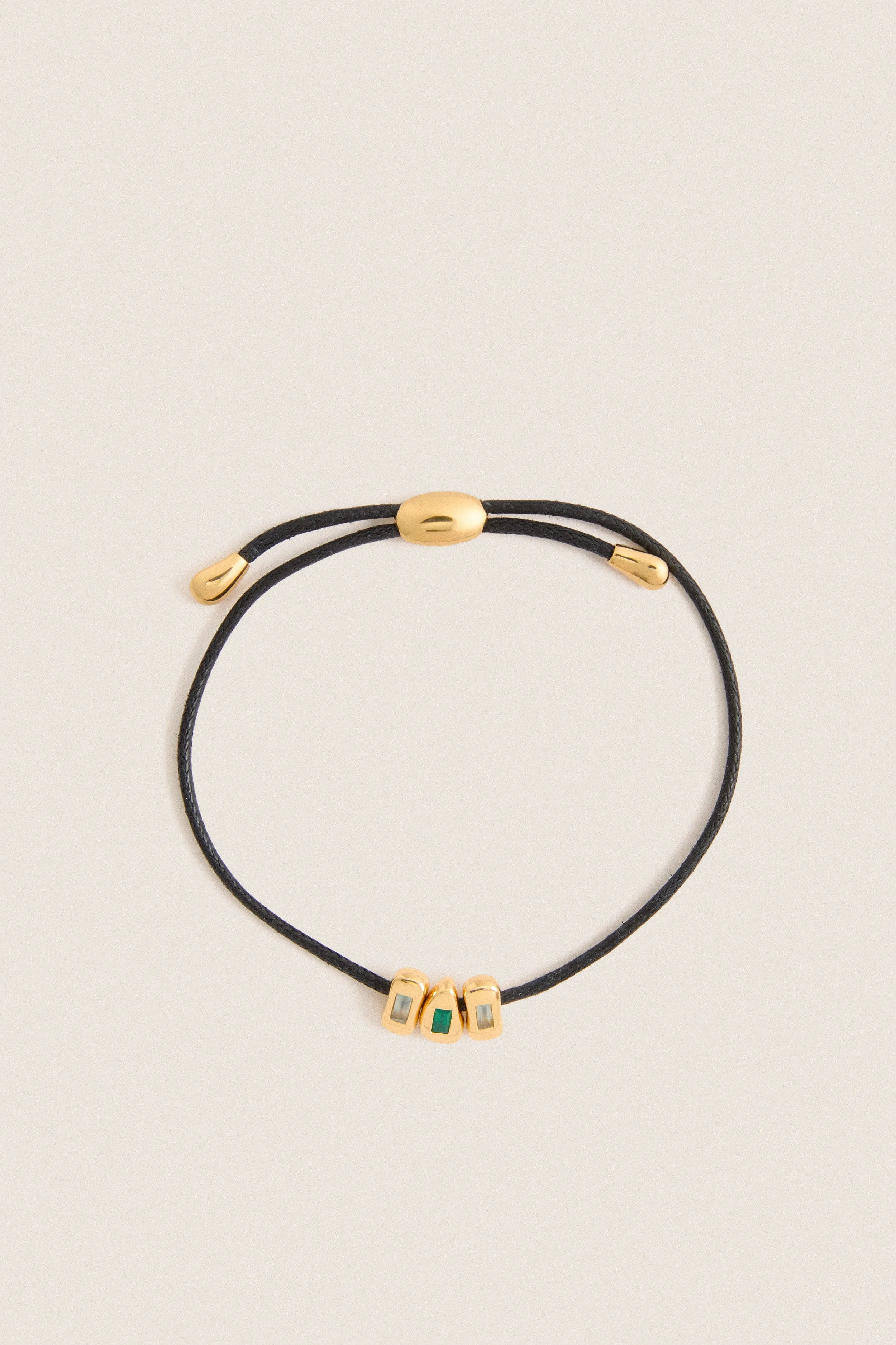 Gold Molten Gemstone Baguette Cord Bracelet sold by Tuckernuck
