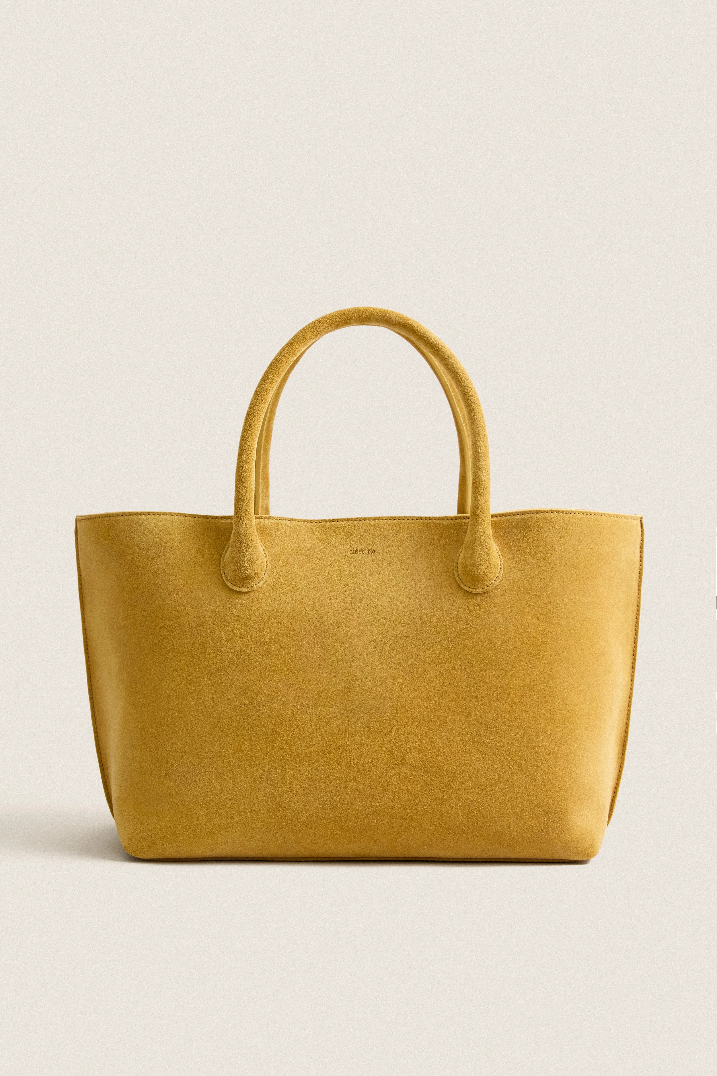 Desert Suede Grace Tote sold by Tuckernuck
