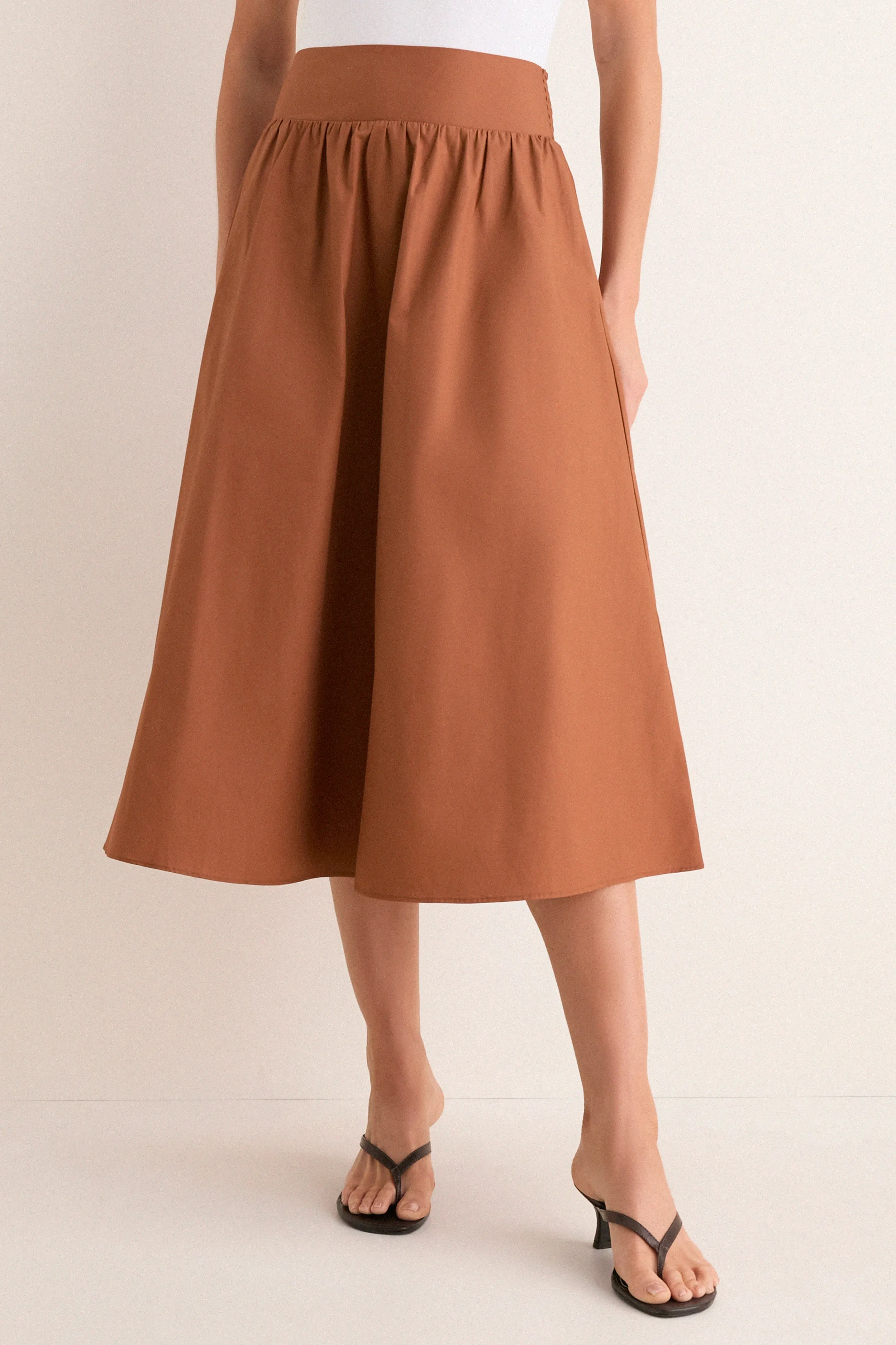 Camel Etienne Smocked Waist Gathered Midi Skirt sold by Tuckernuck