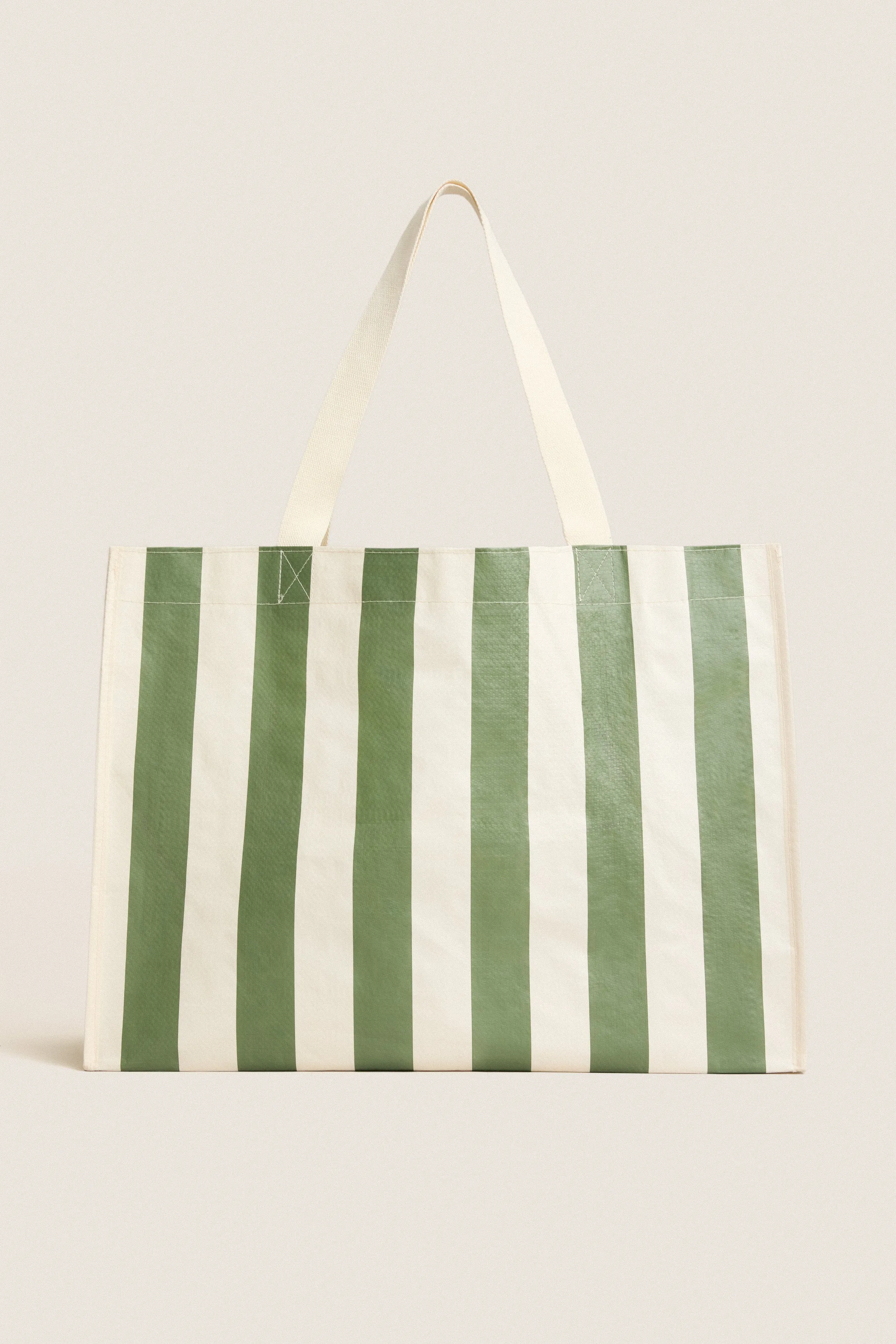 The Vacay Carryall Beach Bag sold by Tuckernuck