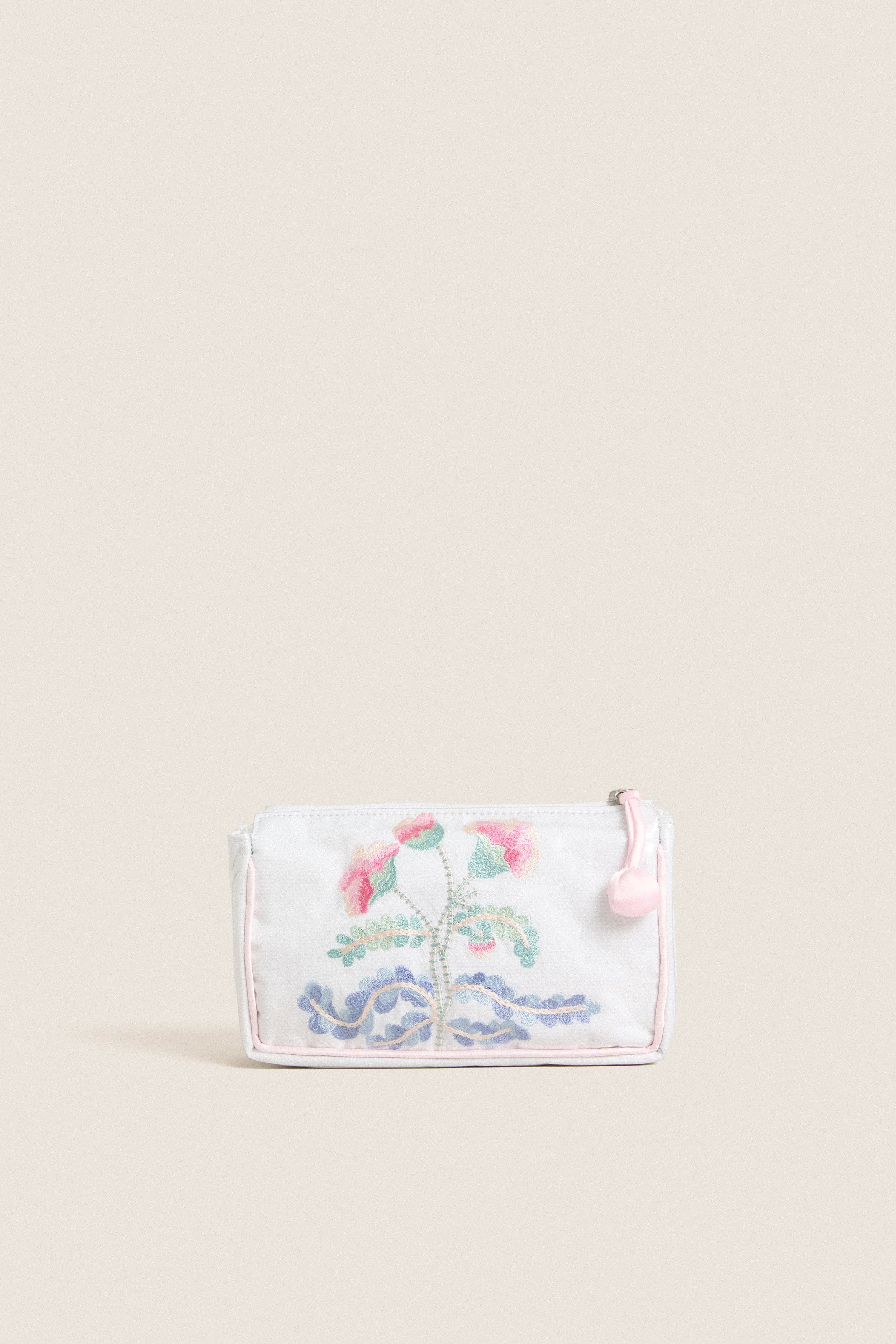 Small Carnation Makeup Bag sold by Tuckernuck