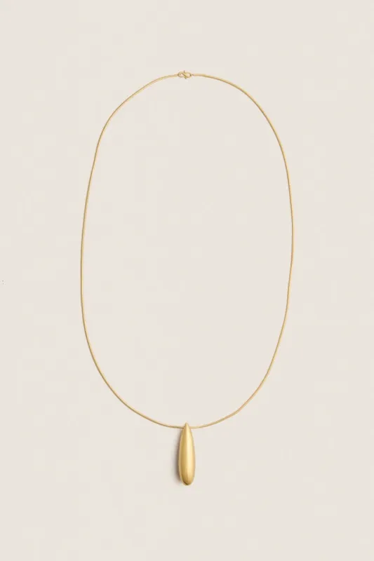 Gold Dolly Necklace made by Tuckernuck