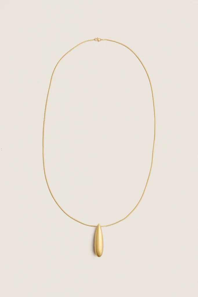 Gold Dolly Necklace sold by Tuckernuck