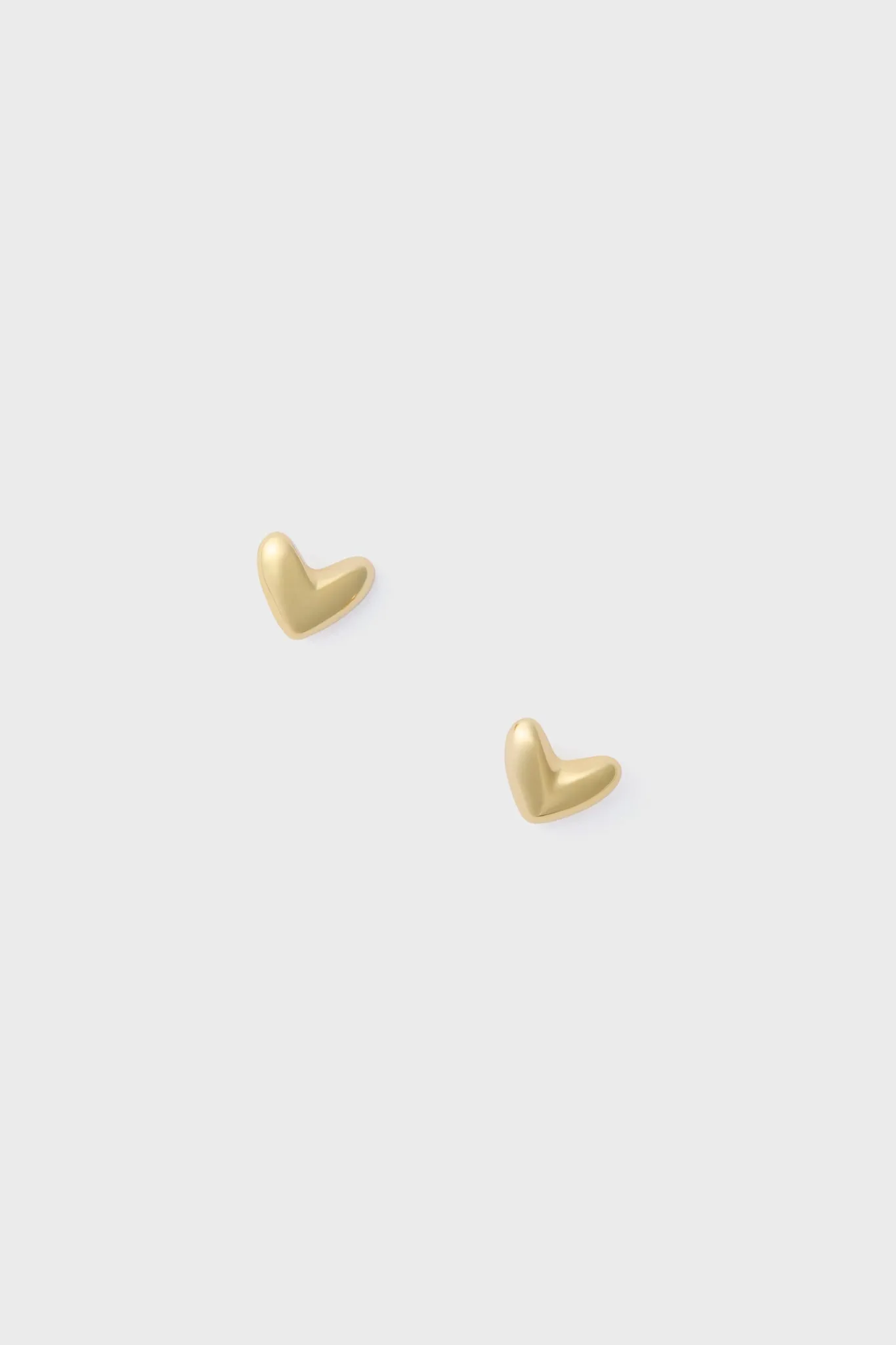 Gold Heart Studs sold by Tuckernuck