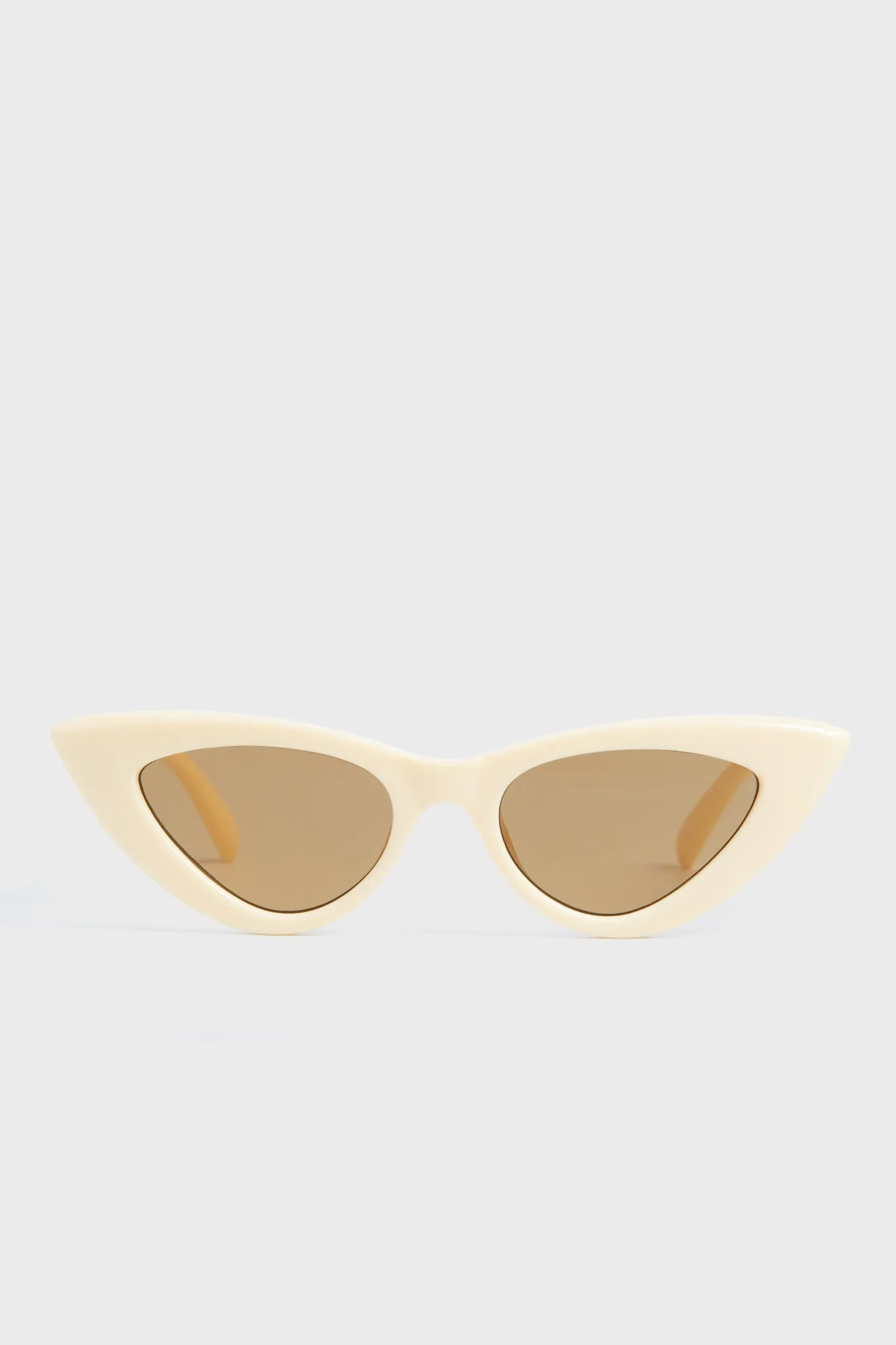 White Hypnosis Sunglasses sold by Tuckernuck