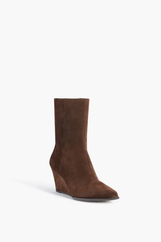 Dark Brown Suede Gwyneth Wedge Boots sold by Tuckernuck