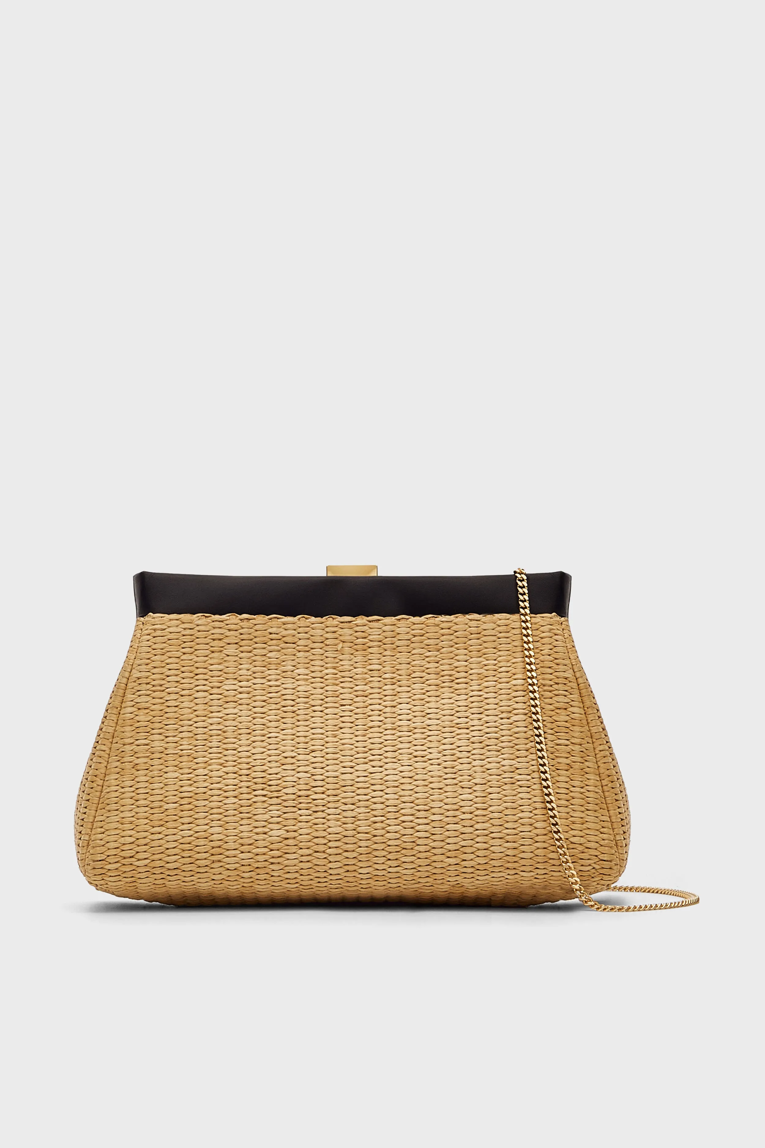 Natural Raffia and Black Cannes Clutch sold by Tuckernuck