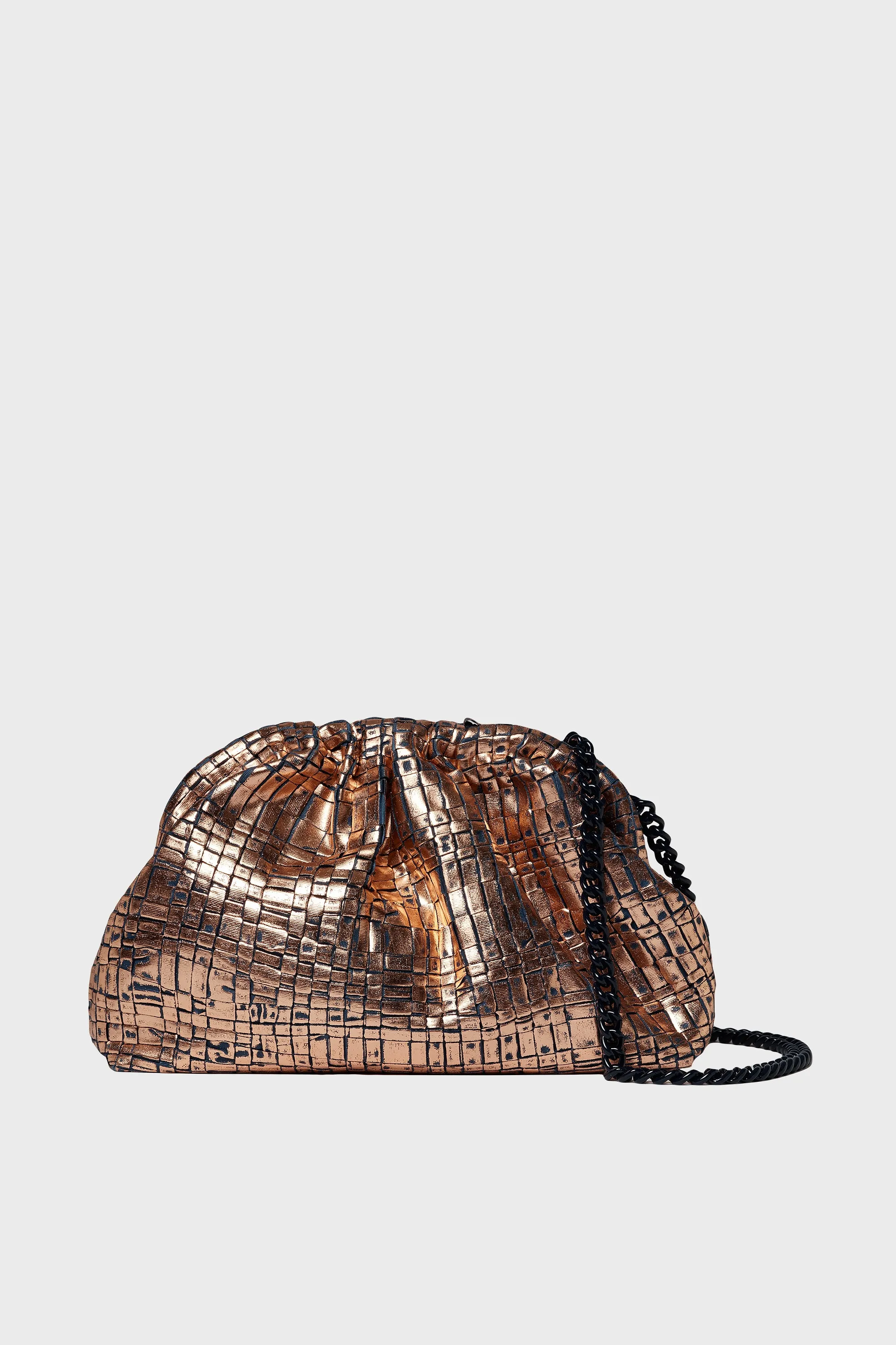 Rosa Metallic Game Clutch sold by Tuckernuck