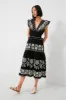 Black Beck Embroidery Flutter Sleeve V-Neck Dress sold by Tuckernuck