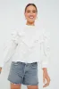 Off White Smocked Yoke 3D Flower Blouse sold by Tuckernuck