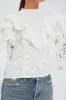 Off White Smocked Yoke 3D Flower Blouse sold by Tuckernuck