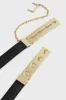Black and Gold Tara Belt sold by Tuckernuck