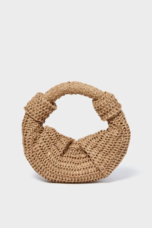 Natural Raffia Lopsy Bag sold by Tuckernuck