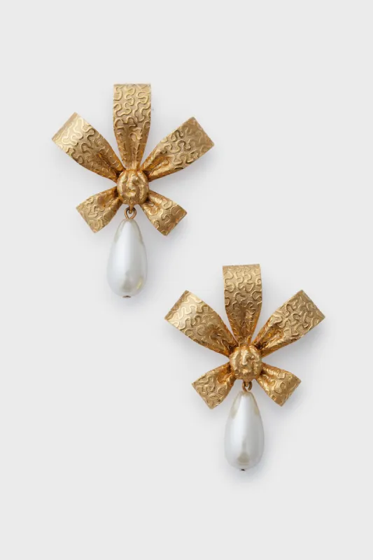 Gold Holi Earrings sold by Tuckernuck