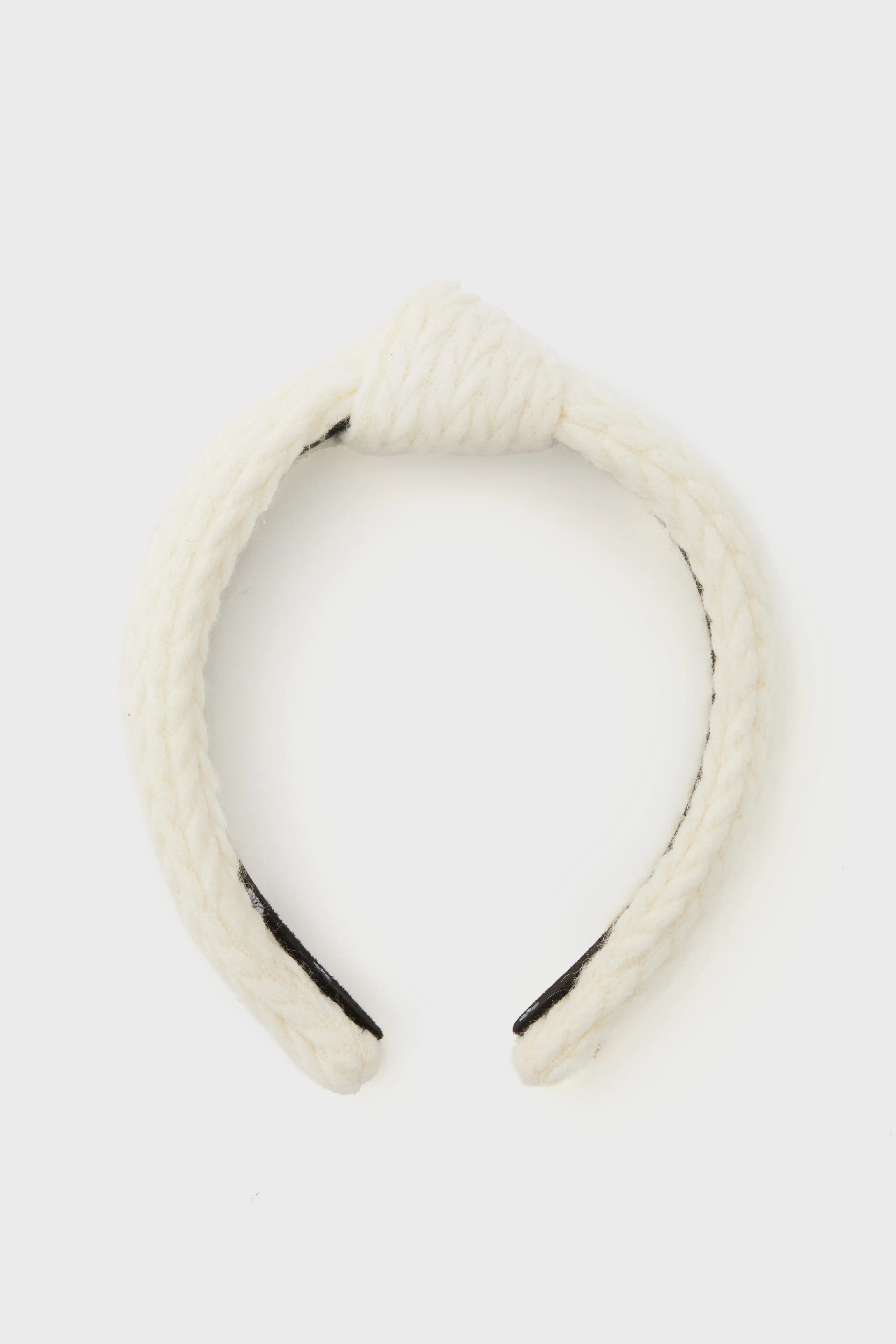 Ivory Cable Knit Slim Knotted Headband sold by Tuckernuck