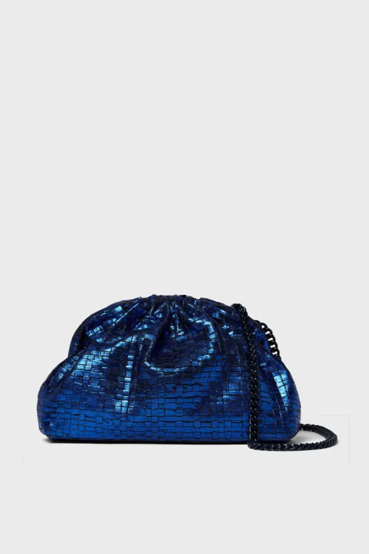 Cobalto Metallic Game Clutch sold by Tuckernuck