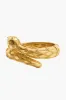 Earth Goddess Serpentina Hinged Bangle sold by Tuckernuck