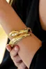 Earth Goddess Serpentina Hinged Bangle sold by Tuckernuck