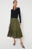 Olive Volume Hem Pleat Detail Skirt sold by Tuckernuck