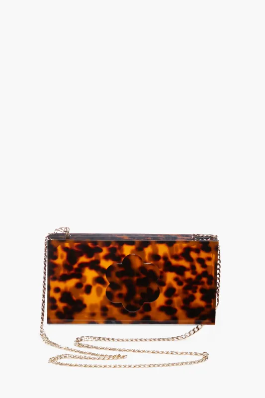 Tortoise Flower Clutch sold by Tuckernuck