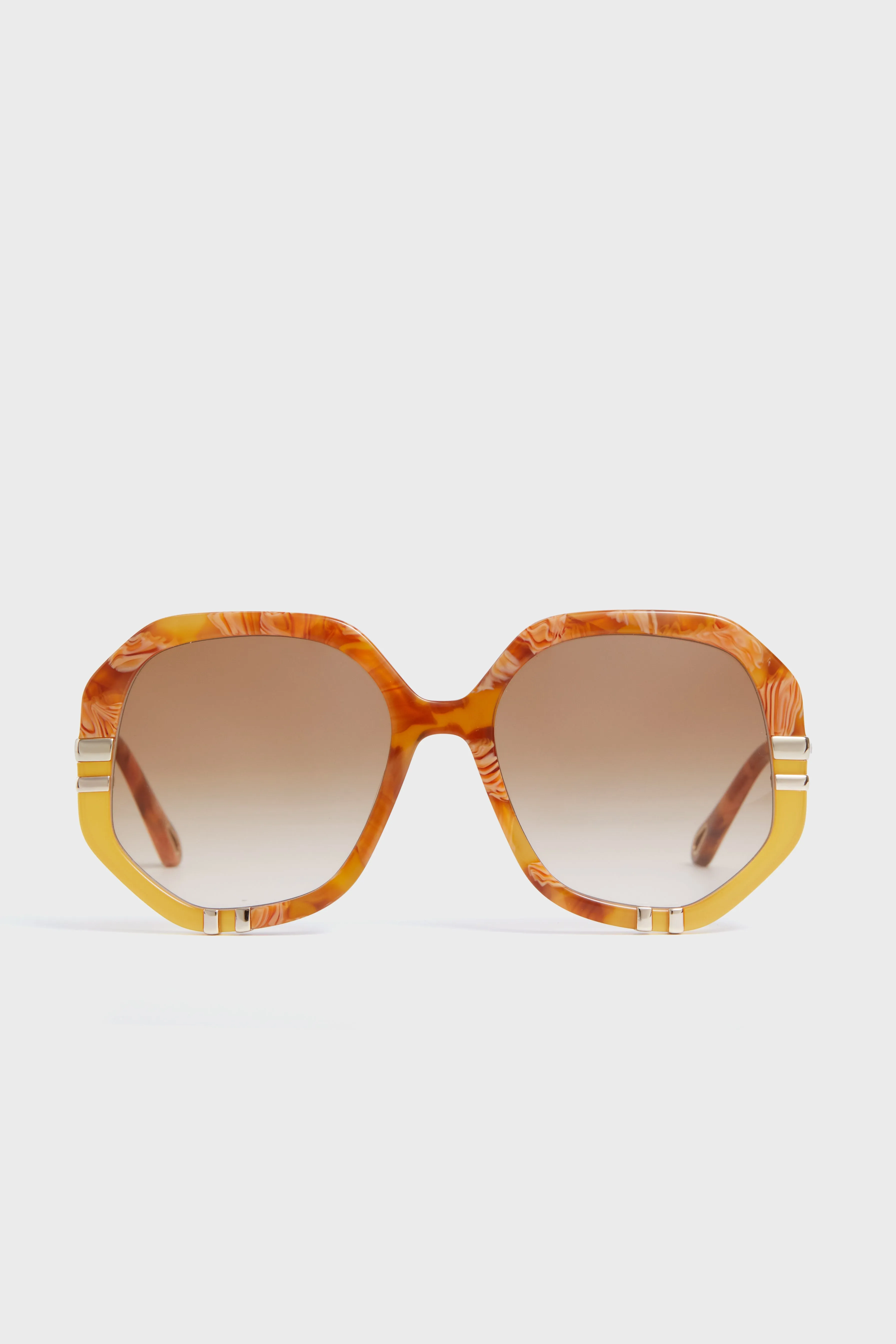 Shiny Caramel and Beige Spotted Havana West Sunglasses sold by Tuckernuck
