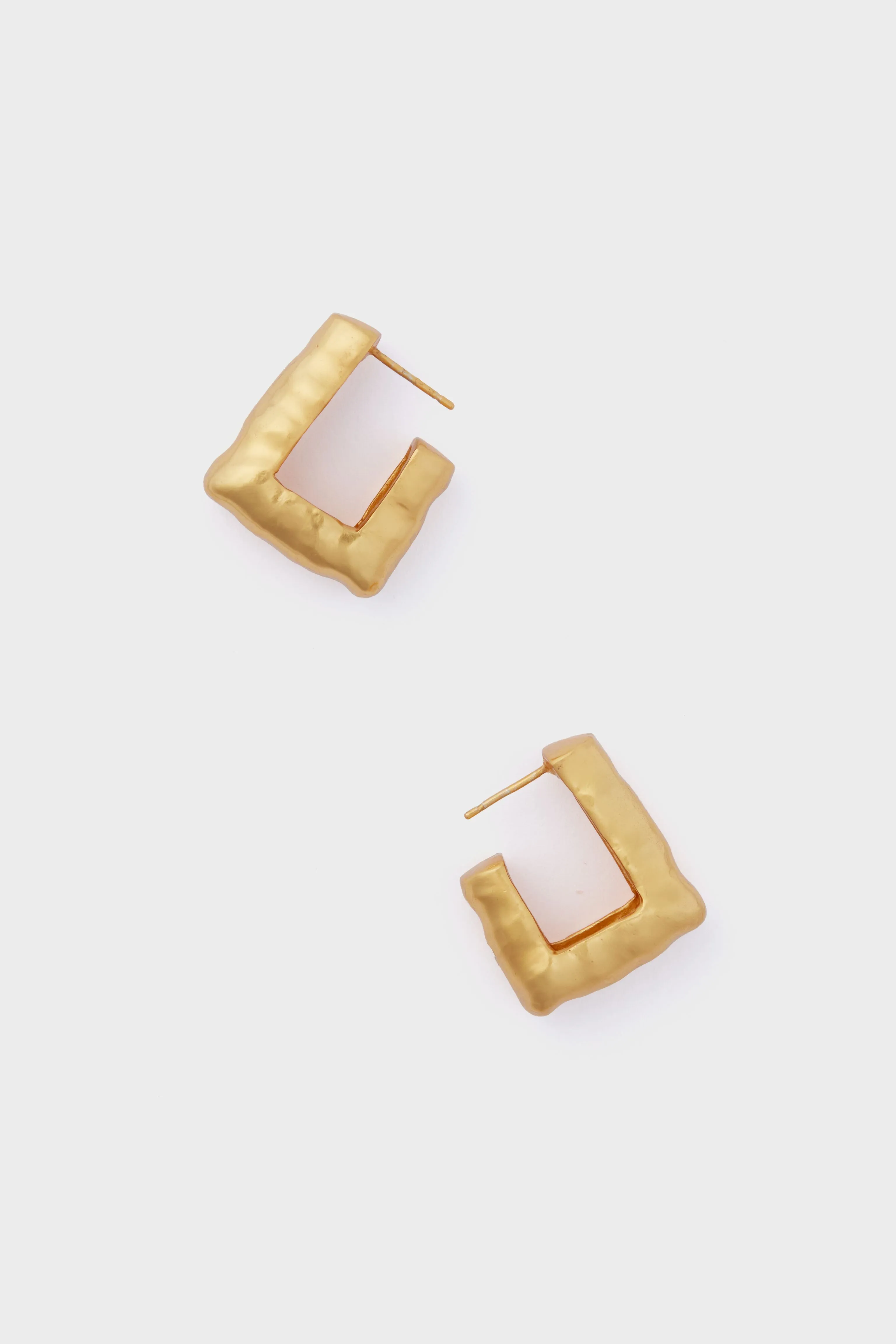 Gold Dim Hoops sold by Tuckernuck