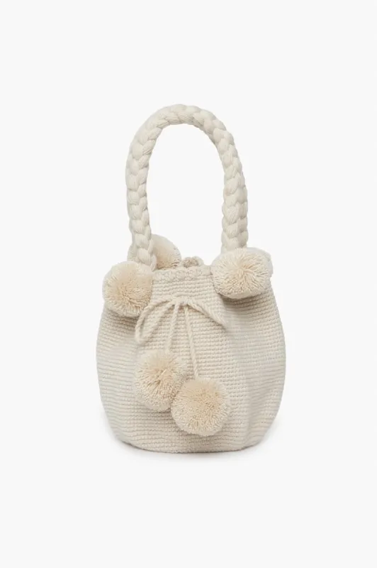 Cream Mini Tassel Bag sold by Tuckernuck