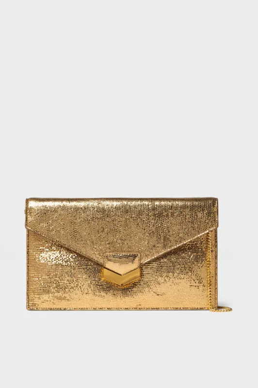 Gold London Clutch sold by Tuckernuck