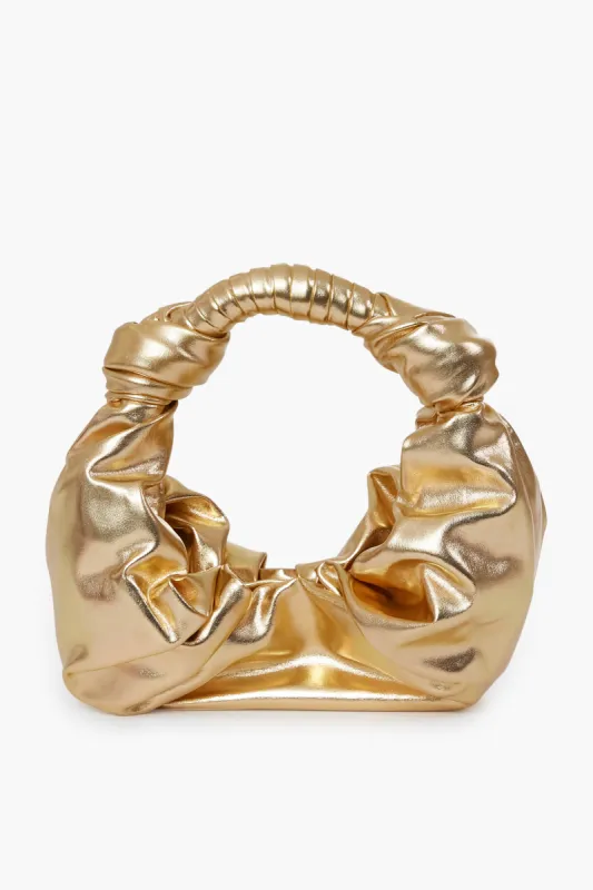 Star Gold Smooth Vegan Leather Lopsy Bag sold by Tuckernuck