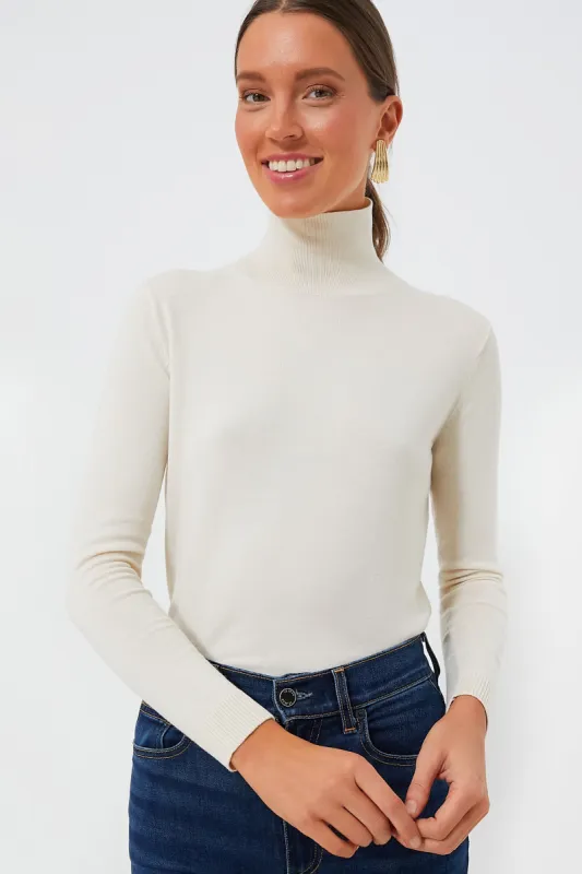 Ivory Kiku Turtleneck sold by Tuckernuck