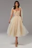 Melon Sparkly midi tulle dress sold by Milla