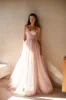 Misty Rose Tulle Maxi Dress with a Corset Bustier sold by Milla
