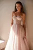 Misty Rose Tulle Maxi Dress with a Corset Bustier sold by Milla