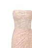 Spectacular sequined maxi dress in gold sold by Milla